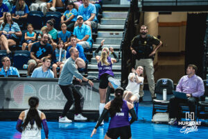 Emerson Van Lannen (13) hits a ball narrowly avoiding bystanders out of bounds in an away game against the Creighton Bluejays on September 18, 2026 in Omaha, Nebraska. Photo by Rob Olvera.