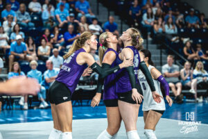 Cadence Lundgren (16) gets hype with Addison Massey (15) in an away game against the Creighton Bluejays on September 18, 2026 in Omaha, Nebraska. Photo by Rob Olvera.