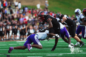 Westside's running back #15 Tristian Gerez-James attempts to hurdle a Central player during a High School Football game, Friday, September 18th, 2026, in Omaha, Nebraska. Photo by Nick Barajas.