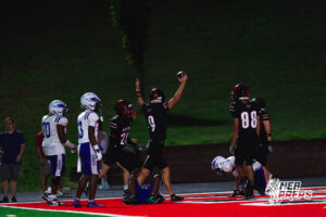 Westside's quarterback #9 Brody Peters celebrates a running touchdown, during a High School Football game, Friday, September 18th, 2026, in Omaha, Nebraska. Photo by Nick Barajas.