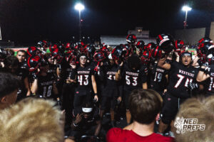 Westside team celebrates with student section after winning a High School Football game, Friday, September 18th, 2026, in Omaha, Nebraska. Photo by Nick Barajas.