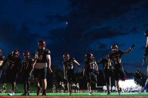 Westside's lineman stretch after halftime, during a High School Football game, Friday, September 18th, 2026, in Omaha, Nebraska. Photo by Nick Barajas.