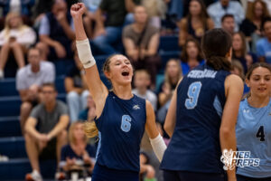 Concordia’s Alyse Moulton (6) yells in celebration after the Mustangs scored a point during a high school volleyball game against Elmwood-Murdock on Thursday, September 17, 2026 in Omaha, Nebraska. Photo By Jack Stephens.