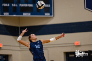 Concordia’s Breckynn Snyder (12) serves the ball during a high school volleyball game against Elmwood-Murdock on Thursday, September 17, 2026 in Omaha, Nebraska. Photo By Jack Stephens.