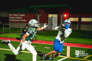 Tory Pittman toe taps and scores during a football game against the Lincoln Southwest Silverhawks on September 25, 2026, in Lincoln, Nebraska. Photo by Rob Olvera.