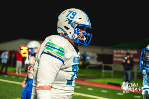 Matt Erickson (79) runs to celebrate with Tory Pittman (3) during a football game against the Lincoln Southwest Silverhawks on September 25, 2026, in Lincoln, Nebraska. Photo by Rob Olvera.