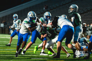 Kylonn Haynie (8) powers through for his first touchdown during a football game against the Lincoln Southwest Silverhawks on September 25, 2026, in Lincoln, Nebraska. Photo by Rob Olvera.