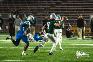 Jaron Faughn (5) pursues the quarterback during a football game against the Lincoln Southwest Silverhawks on September 25, 2026, in Lincoln, Nebraska. Photo by Rob Olvera.
