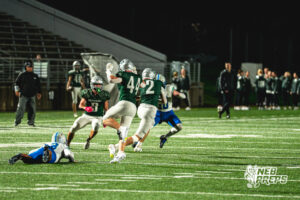 Jacob Terwilliger (2) intercepts the ball and returns during a football game against the Millard North Mustangs on September 25, 2026, in Lincoln, Nebraska. Photo by Rob Olvera.