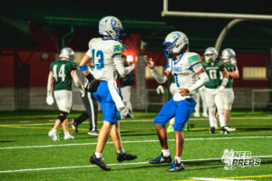 Logan Grosdidier and Cecilio Loredon celebrate a touchdown during a football game against the Lincoln Southwest Silverhawks on September 25, 2026, in Lincoln, Nebraska. Photo by Rob Olvera.