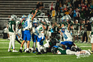 Justin Barnes gets hype after a tackle for loss during a football game against the Lincoln Southwest Silverhawks on September 25, 2026, in Lincoln, Nebraska. Photo by Rob Olvera.