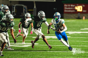 Ethan Cutler (10) scrambles during a football game against the Lincoln Southwest Silverhawks on September 25, 2026, in Lincoln, Nebraska. Photo by Rob Olvera.