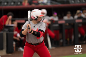Kali Bogart waits for a pitch in a college softball game.