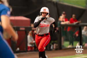 Samantha Bolding runs the bases in a college softball game.