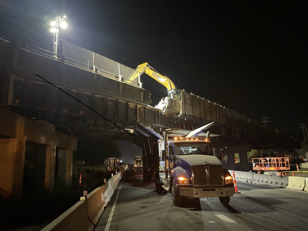 Demolition of parapet and deck on the Murdock Avenue Bridge