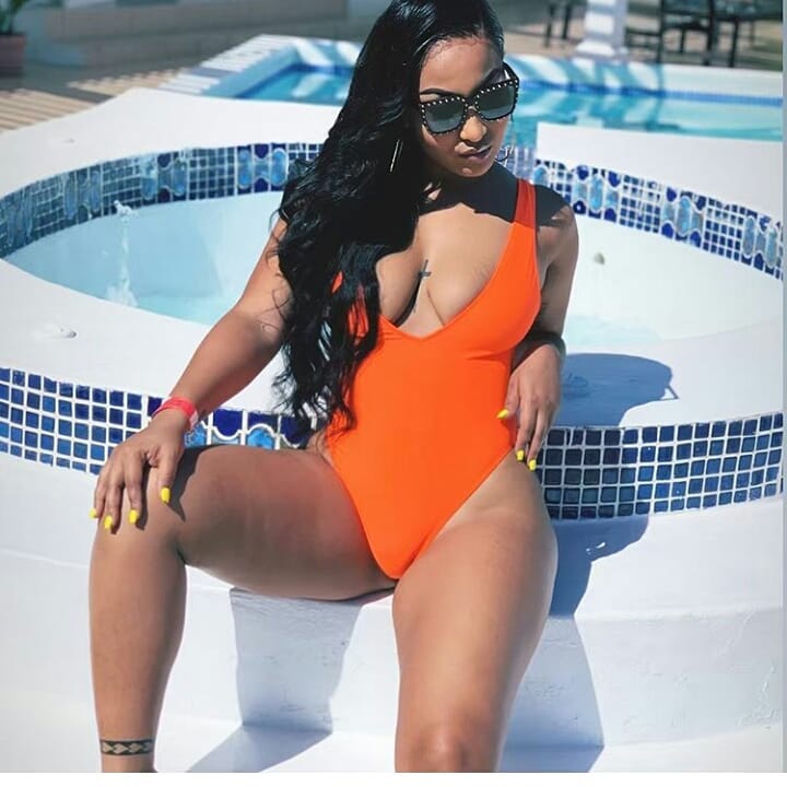 shenseea orange swimsuit
