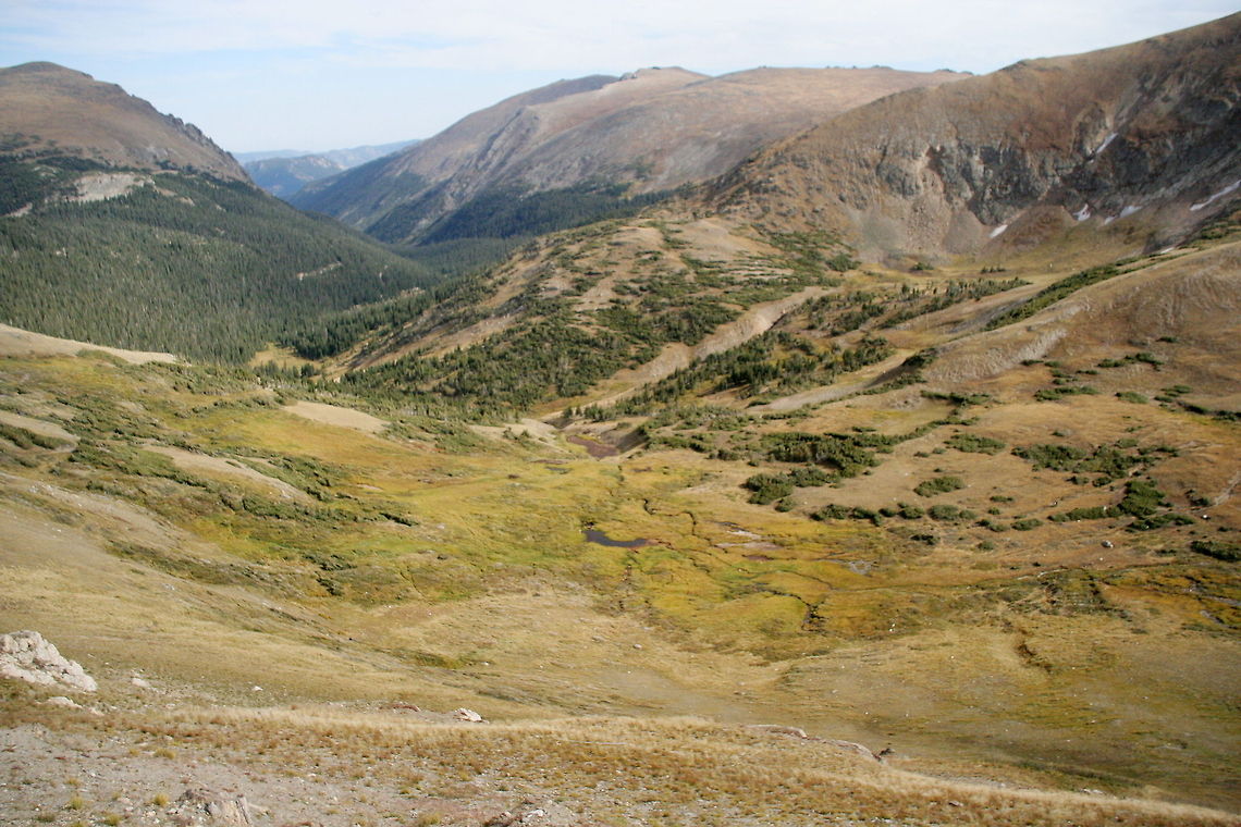 Mountain tundra view High up in the mountains, it is so cold even in the summer, that the actual climate resembles a tundra climate. This picture was taken high up on a mountain in the Rocky Mountains National Park National park,North America,Rocky Mountains,Tundra,United States
