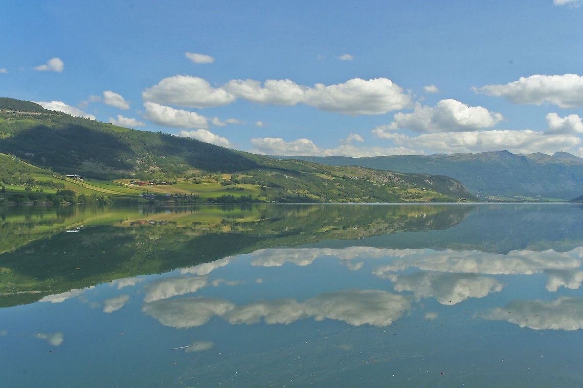 Perfect lake reflection The reflection of this lake is almost perfect, making this a surrealistic landscape. This photo was taken in central Norway Europe,Landscapes,Norway,Reflection