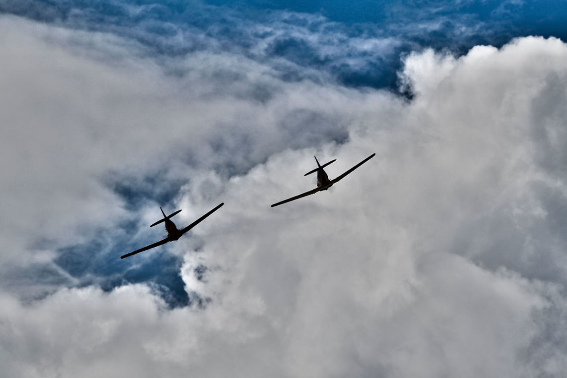 Iron Birds An in flight shot of two aeroplanes against the clouds. Clouds