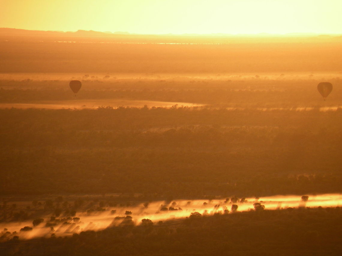 Sunrise dust Sunrise dust from hot air balloon near Alice Springs, Northern Territories, Australia Balloon
