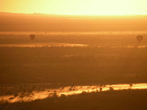 Sunrise dust Sunrise dust from hot air balloon near Alice Springs, Northern Territories, Australia Balloon