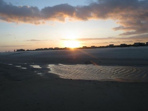 Beach Sunset the sunset between the houses on the beach Beach,Clouds,Geotagged,Sky,Sunset,United States,sand,sun,water