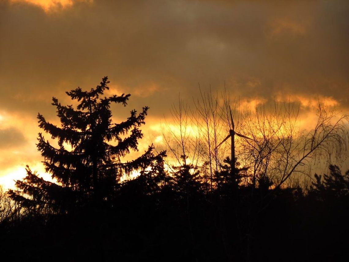 Windmill a windmill at sunset at Appalachian State University Geotagged,Mountains,Shadows,Sunset,United States,windmill