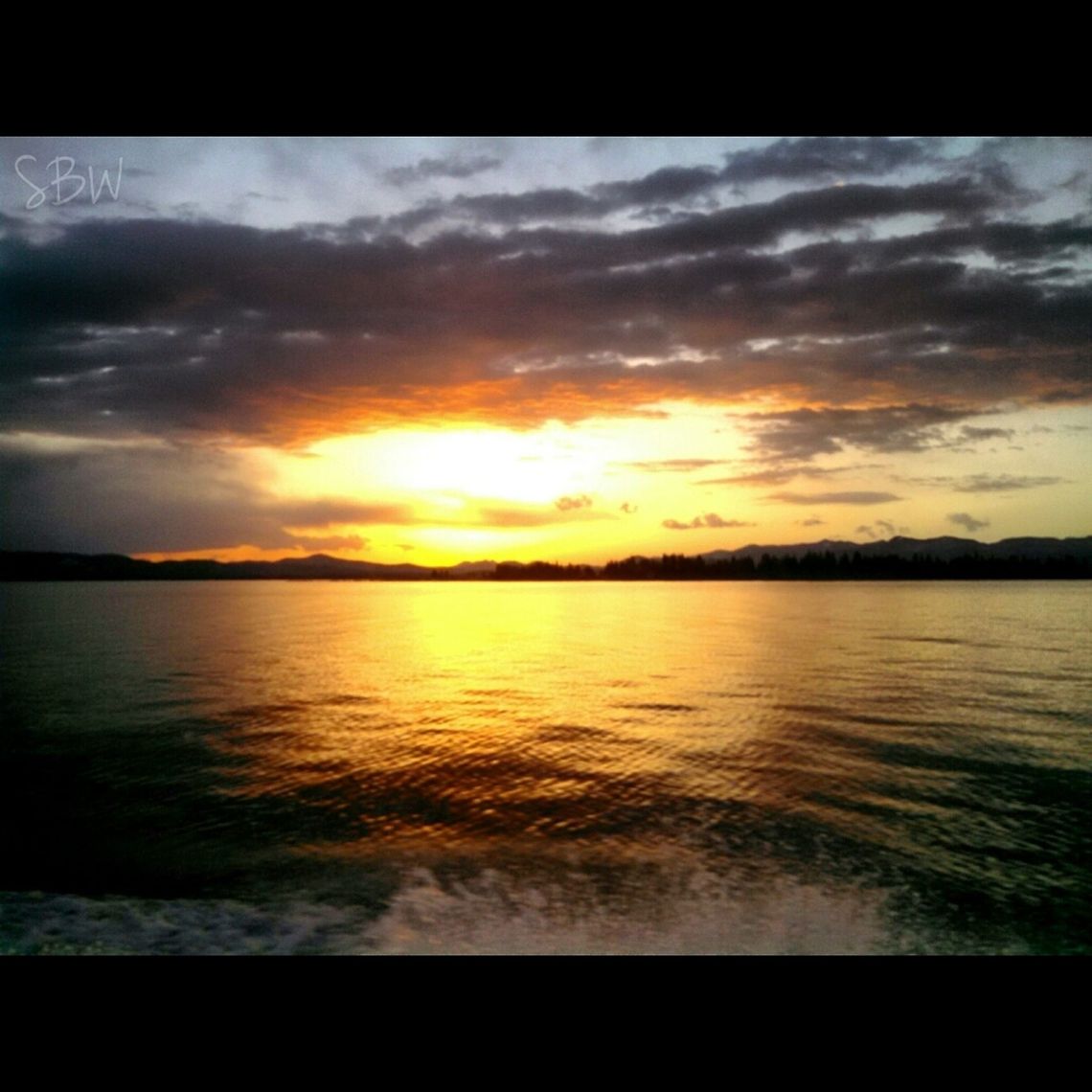Yellowstone Lake Fiery Sunrise Woke up for work after a previously, nasty day to see this beautiful sunrise. Lake,Sunrise