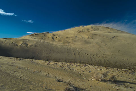 The power of the sun When the last of the clouds disappeared and the sun was at it's full affect the wind whipped up amazingly - until it started getting into everything (including my pockets and ears…) it was great fun watching the sand whip up and away over the top of the dune. Geotagged,United States,Winter