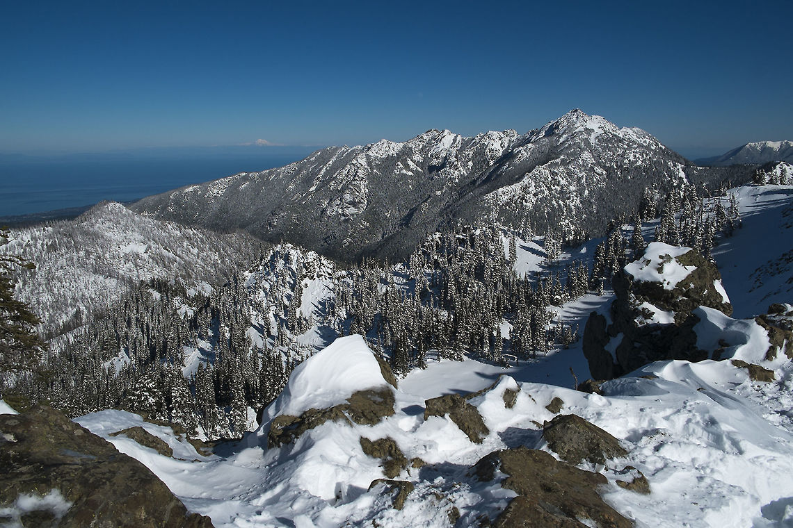 View from the summit of Hurricane Hill I think that little mountain way far off is Mt. Baker. It was a very clear day indeed.<br />
I usually just pick one general landscape per trip to post here, but if you like them, there&#039;s nearly always more on my flickr account <a href="https://flic.kr/ps/MMu5N" rel="nofollow">https://flic.kr/ps/MMu5N</a> Geotagged,United States,Winter