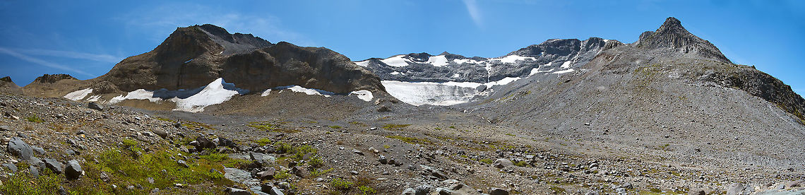 On the Wonderland Trail This is approaching Panhandle Gap, the highest point on the Wonderland Trail at Mount Rainier. (Other trails climb higher - and then of course some people do summit the mountain - it&#039;s often used as training for Mt. Everest!). In many years this might still have snowfields to cross, even at this point in summer, but this year has been uncommonly warm and there were no snow fields at all, even at the gap.<br />
4 image stitched panorama Geotagged,Summer,United States