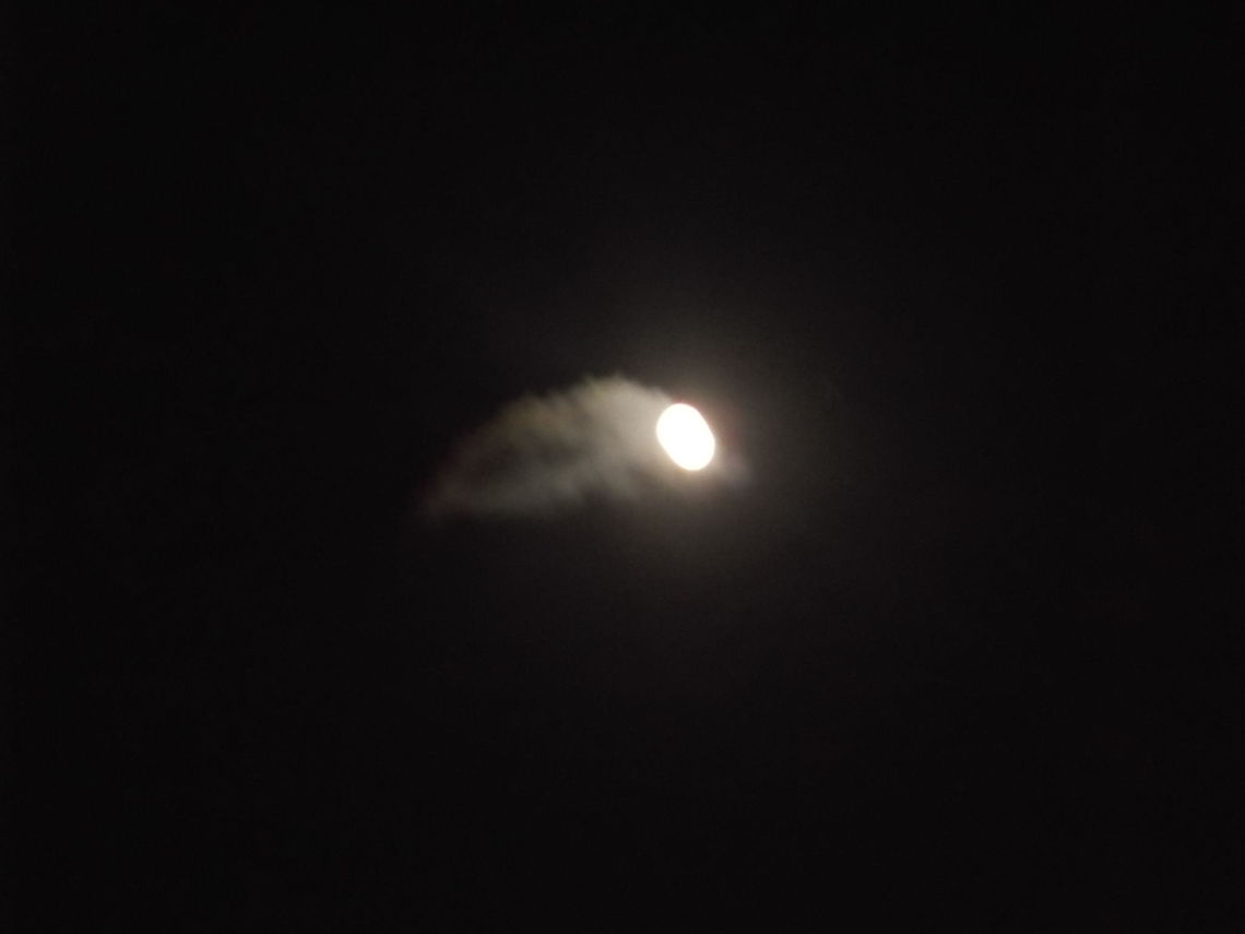 LUNAR CLOUD GOING ACCROSS THE MOON moon