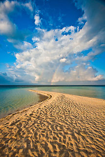 Rainbow over beach Rainbow over south beach of South Water Caye, Belize Belize,Dangriga