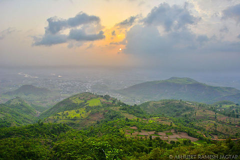 Dawning at its Best after searching serpents for whole night..  We were descending these hills.. 
It was beautiful.. Those golden rays were illuminating these settlements and fields..
It was all living and breathing..
 18-105,D5200,Matheran,Nikkor,Nikon,NikonD5200,abhitap,hill,hills,landscape,landscapes,sahyadri,sahyadris,unesco,wallpaper,western ghats,worldheritagesite