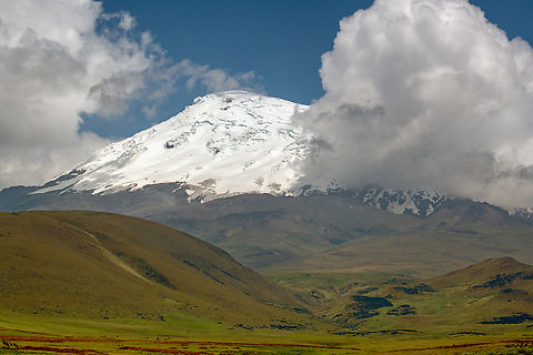 Snow-capped Antisana Volcano, Ecuador Behold the snow-capped peak of Antisana Volcano, after which this reserve is named. Due to the ever present clouds, you need some luck to get a glimpse of it, this was our third try.

It's an active volcano that last erupted in 1802. Its peak is at 5,704m, making it Ecuador's 4th tallest peak. It's possible to climb to the summit. As I was about to do so, our guide said we don't have time for this and he preferred me alive to pay for the trip.
https://www.jungledragon.com/image/130053/closeup_of_snow-capped_antisana_volcano_ecuador.html
https://www.youtube.com/watch?v=FA8j5RyxPMs Antisana Ecological Reserve,Ecuador,Ecuador 2021,Geotagged,South America,Spring,World