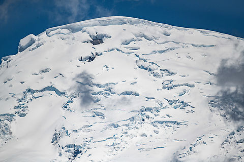 Closeup of snow-capped Antisana Volcano, Ecuador Behold the snow-capped peak of Antisana Volcano, after which this reserve is named. Due to the ever present clouds, you need some luck to get a glimpse of it, this was our third try.

It's an active volcano that last erupted in 1802. Its peak is at 5,704m, making it Ecuador's 4th tallest peak. It's possible to climb to the summit. As I was about to do so, our guide said we don't have time for this and he preferred me alive to pay for the trip.
https://www.jungledragon.com/image/130052/snow-capped_antisana_volcano_ecuador.html
https://www.youtube.com/watch?v=FA8j5RyxPMs Antisana Ecological Reserve,Ecuador,Ecuador 2021,Geotagged,South America,Spring,World
