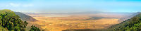Ngorongoro Crater mega panorama This is one of the world's most famous wild landscapes. The Ngorongoro crater is part of the larger Ngorongoro conservation area,  a UNESCO World Heritage Site, and one of Africa's 7 natural wonders. Some refer to it as nature's greatest Amphitheatre or Noah's Arc. The area is also known as the birth place of humanity.<br />
<br />
The crater is the largest collapsed volcano cone in the world. The remaining crater is truly huge. In this photo I am standing on one edge of the crater, overlooking a crater inner field of 17 by 21 kilometers. Not only is this a geological marvel, it is also a wildlife marvel. Most of the animals living on the crater floor are somewhat stuck there. Birds and courageous mammals can escape, but most feel trapped. Although the crater floor is huge, it is also extremely flat. This brings some spectacular wildlife dynamics: predators and prey have few places to hide and are in constant eye contact. Try living, sleeping or raising young ones in such a place of constant threat. Africa,Geotagged,Ngorongoro,Ngorongoro Crater,Serengeti area,Tanzania