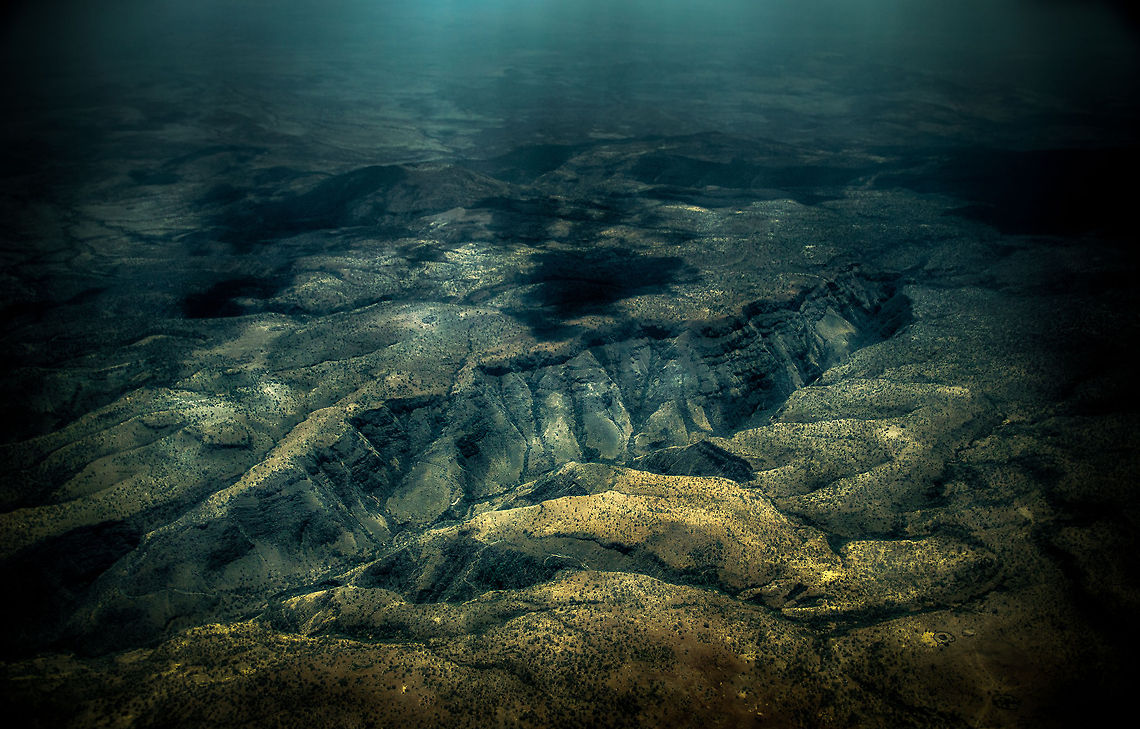 Tanzania mountain ranges from the air - 3 A series of photos of Tanzania from the air. The originals were so soft due to light pollution and the airplane window that I had to go a little overboard in post processing.  Africa,Serengeti North,Serengeti area,Tanzania