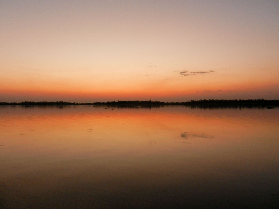 Pantanal sunset Sunset refelction on a swampy lake in the Pantanal, taken from our boat. Brazil,Pantanal,Sunset