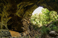 Entry to the Cave of Bats, Ankarana, Madagascar After about 3 hours of hiking on our 2nd day, we arrived at the entrance of this "Cave of Bats", one of many caves in the Ankarana reserve, some to be claimed the longest in the whole of Africa. <br />
<br />
Some cultural rules apply here. You have to take of any hats. Furthermore, "people from the capital" are denied entry altogether, so we had to leave behind our guide here. This is due to a history of tribal warfare. Africa,Ankarana,Madagascar,Madagascar North,World