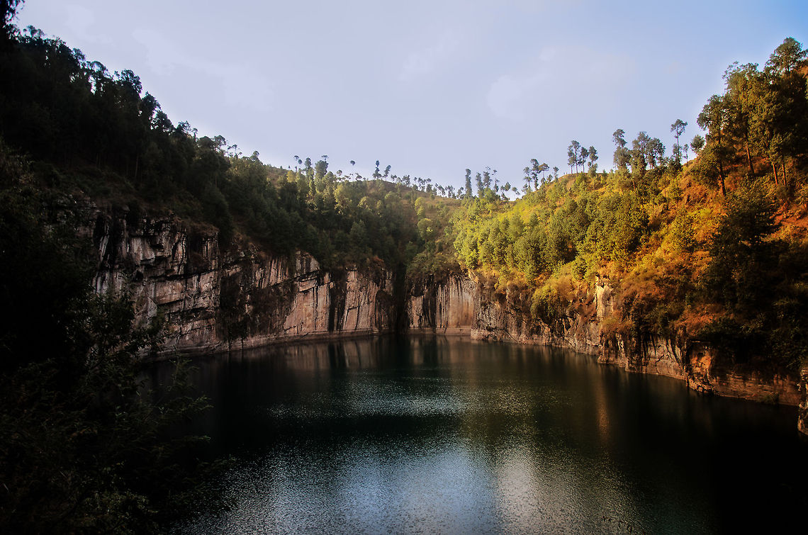 Lake Tritriva around sunset Sunlight leaving the crater lake Lake Tritriva in Madagascar. Lake Tritriva,Madagascar