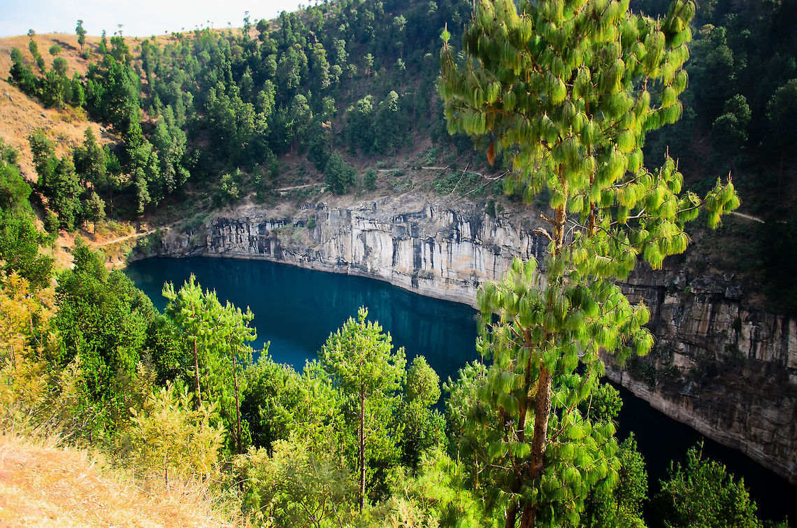 Lake Tritriva overview Full scene shot of crater lake "Tritriva" in Madagascar. It's quite a beautiful place to visit, but be prepared for lots of beggers joining you on your walk. Geotagged,Lake Tritriva,Madagascar