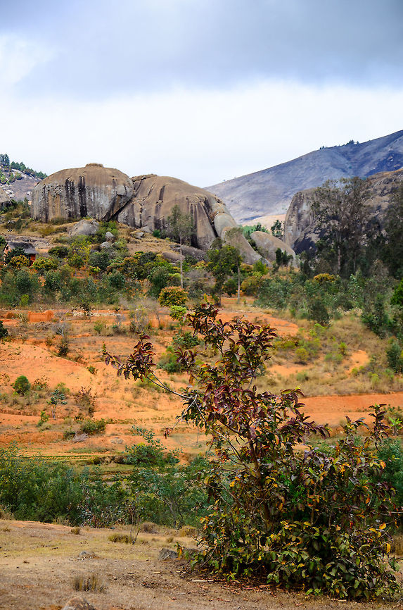 Ambositra landscapes 1 The scarred beauty of the Ambositra area, a mixture of mountain ranges, the typical red soil of Madagascar, agriculture and some small pockets of green. Ambositra,Geotagged,Madagascar
