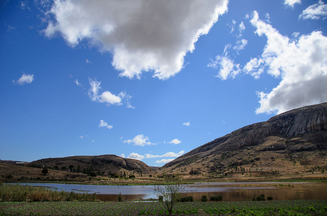 The pool of lemurs This little lake/pond on the edge of the Anja reserve of Madagascar is a main drinking place for lemurs and other animals. We did spot them drinking, but unfortunately my tele lens had a fog problem on this day. Anja Reserve,Geotagged,Madagascar