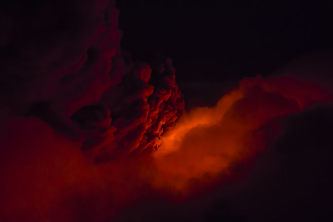Flame and fire On December 28th, 2014, Mount Etna produced a so violent as brief eruption with emission of lava and ash. <br />
The high-altitude clouds mixed with ash cloud have created a unique show of its kind. Geotagged,Italy,Natural events,Winter,ash,clouds,demon,devil,eruption,etna,fire,hell,lava