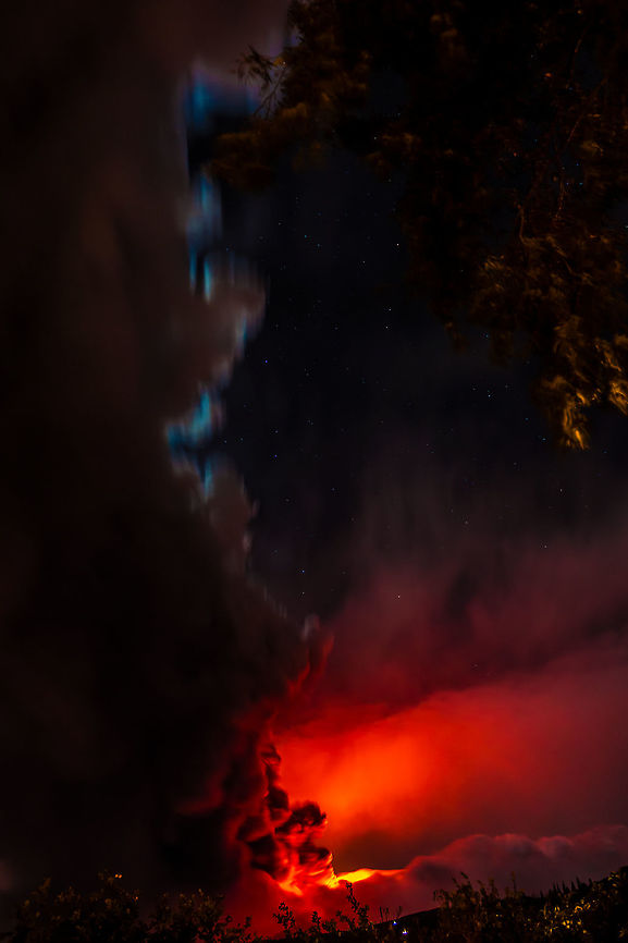 The awaking of the volcano On December 28th, 2014, Mount Etna produced a so violent as brief eruption with emission of lava and ash. <br />
The high-altitude clouds mixed with ash cloud have created a unique show of its kind. Clouds,Geotagged,Italy,Winter,ash,eruption,etna,flames,hell,lava