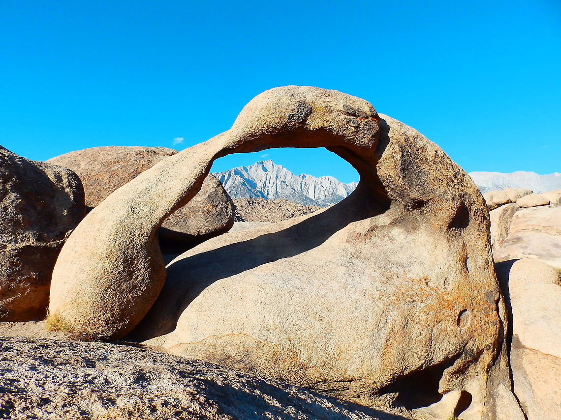 Mobius Arch - Alabama Hills, CA Alabama Hills in Sierra Nevada, close to the town of Lone Pine have been the ideal scenery for many cowboy movies, including those by John Wayne (<a href="https://en.wikipedia.org/wiki/List_of_films_shot_in_Lone_Pine)" rel="nofollow">https://en.wikipedia.org/wiki/List_of_films_shot_in_Lone_Pine)</a>.<br />
One natural formation there, is the Mobius Arch, that perfectly frames Mount Whitney in the background.<br />
<a href="http://www.sierranevadageotourism.org/content/alabama-hills-natural-arch/siec867c1748aafcc202" rel="nofollow">http://www.sierranevadageotourism.org/content/alabama-hills-natural-arch/siec867c1748aafcc202</a> Common side-blotched lizard,Geotagged,Summer,United States,Uta stansburiana,alabama hills,california,landscape,mobius arch,scenery