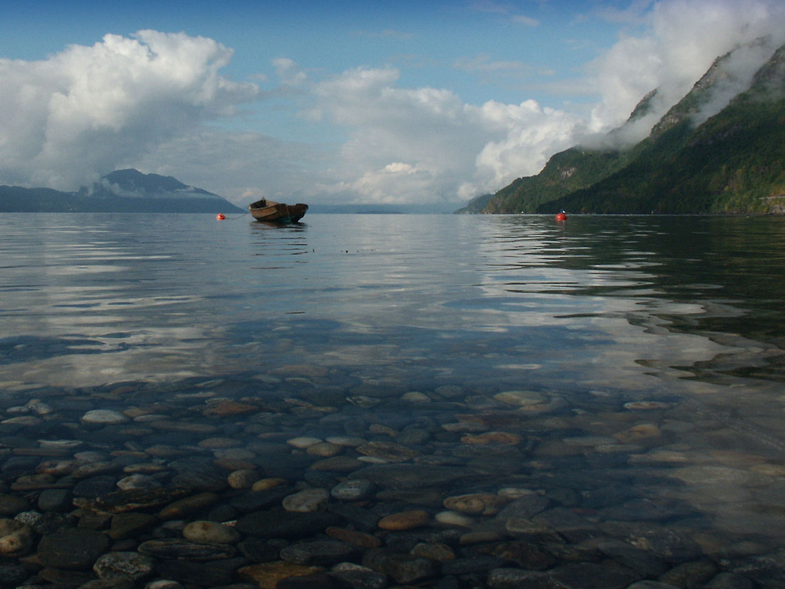 Hardangerfjord - clean, blue, cold Norway is nice. It's impressively nice, and that's still an understatement. This picture was taken at Hardangerfjord. It doesn't look like a potentially deep fjord from the shore, but at its deepest  blue it is 725 meters to rock bottom. A lot of very tall buildings stacked. Wow. With a length equaling the height of Belgium, 170+ kilometers, it is very impressive.  Geotagged,Hardangerfjord,Norway,boat