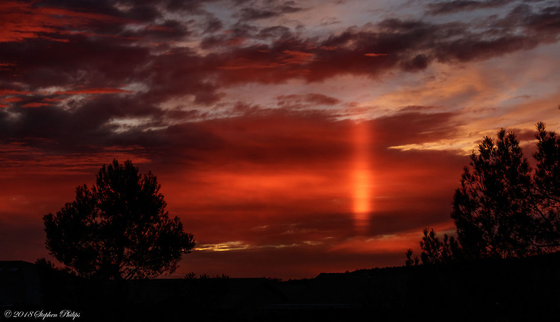 Beaming light Sunsets in the deserts of Arizona can be some of the most amazing in the world. This sunset had the sun beaming through an opening above the horizon in such a way that created a very narrow beam that lasted only a few minutes. I was very fortunate to have been able to capture it in this way. Fall,Geotagged,United States