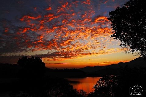 The evening sky A rare view Geotagged,India,Kerala,Silverwoods resort,Winter,banasura sagar dam,crimson,evening,sky,sunset,wayanad